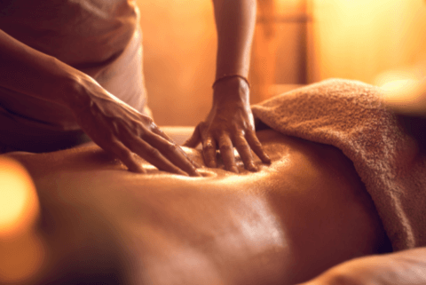 Couple giving an at home massage.