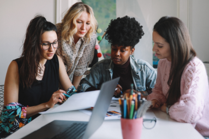 Women learning how to reduce workplace stress to better their health.